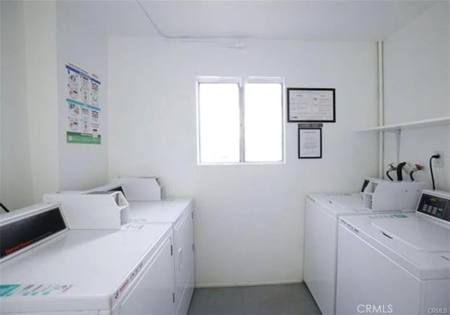 laundry area featuring separate washer and dryer