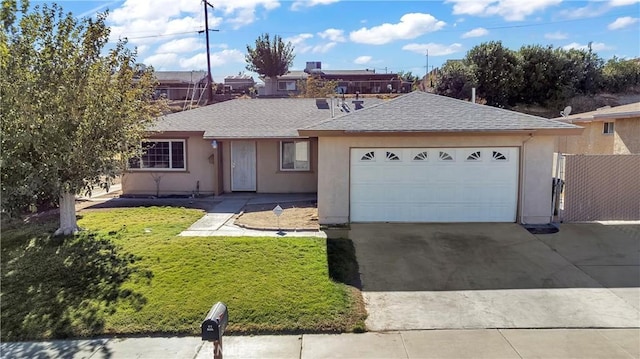 ranch-style house with a front yard and a garage