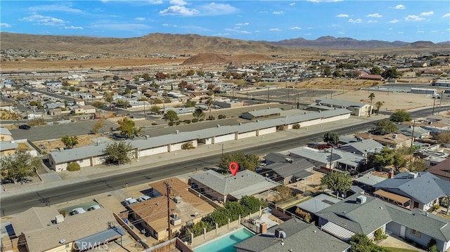 drone / aerial view featuring a mountain view