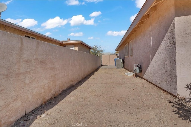 view of home's exterior with cooling unit