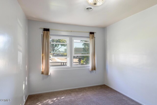 view of carpeted spare room