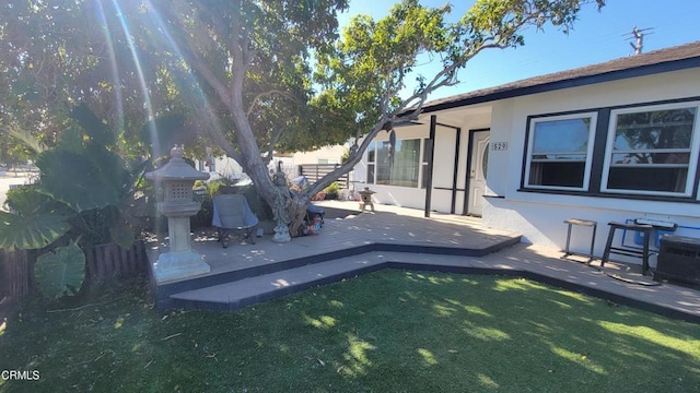 exterior space featuring a yard and fence