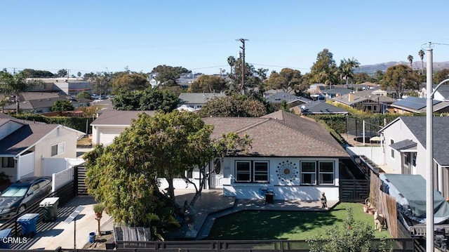 birds eye view of property with a residential view