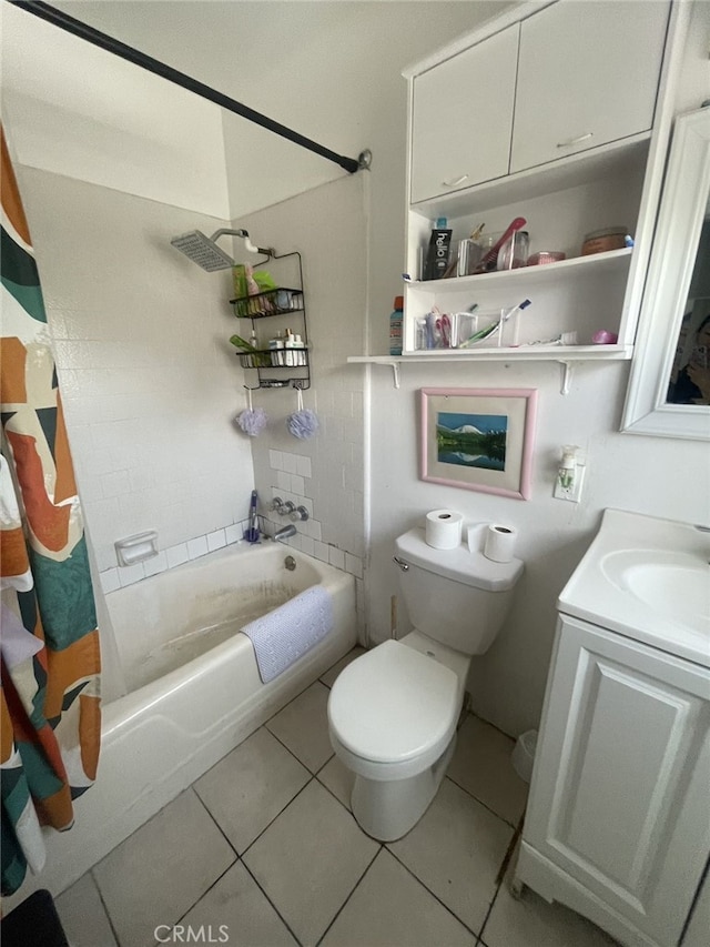 full bathroom with tile patterned floors, shower / bath combo, toilet, and vanity