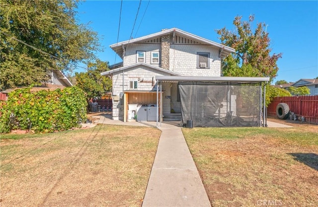 front facade with a front yard