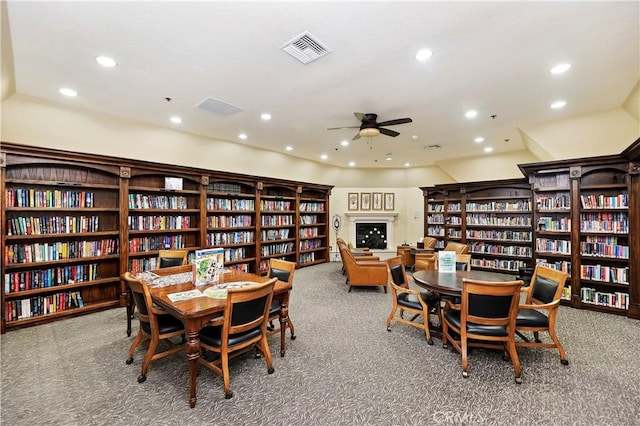 dining room featuring carpet floors and ceiling fan