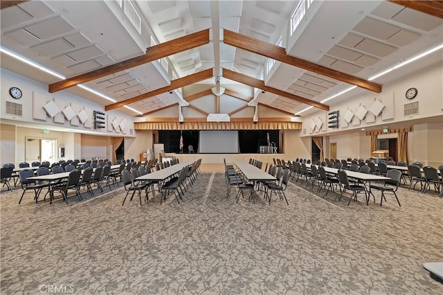 misc room with carpet flooring, high vaulted ceiling, and beam ceiling