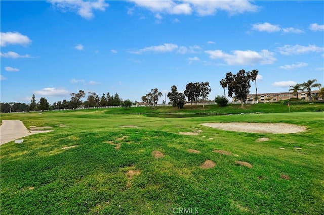 view of home's community featuring a lawn