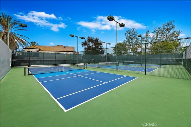 view of tennis court with basketball court