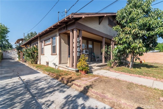 view of front of home featuring covered porch