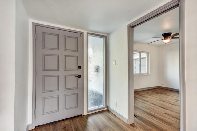 entryway featuring ceiling fan and light hardwood / wood-style flooring