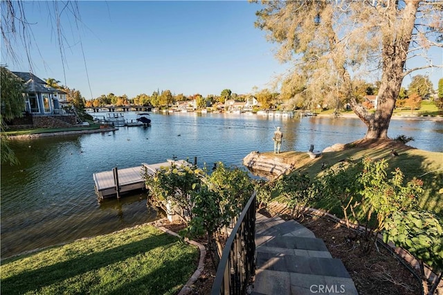 dock area featuring a water view