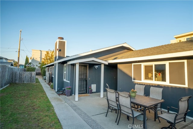 back of house featuring a patio