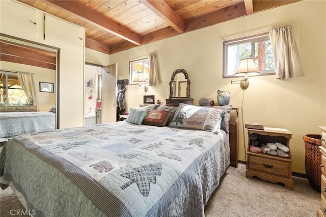 bedroom with light carpet, beam ceiling, and wooden ceiling