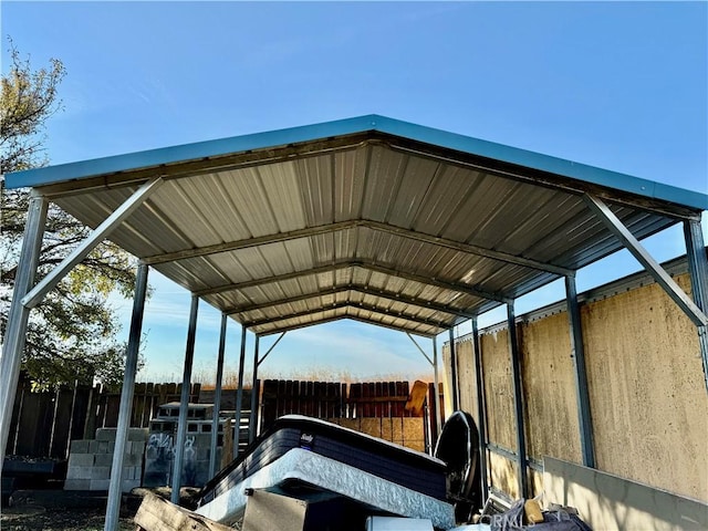 view of parking / parking lot with a carport