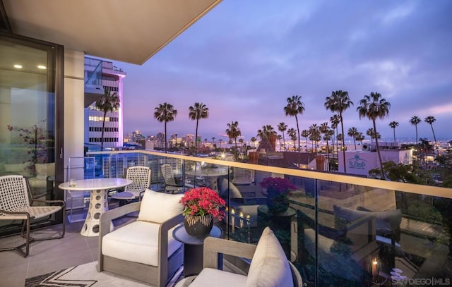 view of balcony at dusk