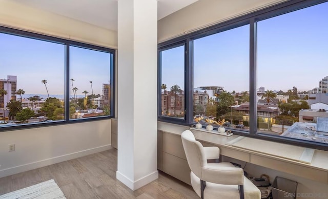 office space with light hardwood / wood-style flooring