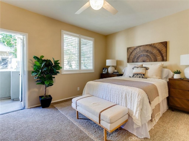 bedroom with light carpet, access to exterior, and ceiling fan