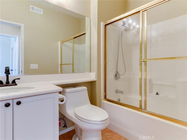 full bathroom with vanity, combined bath / shower with glass door, and toilet