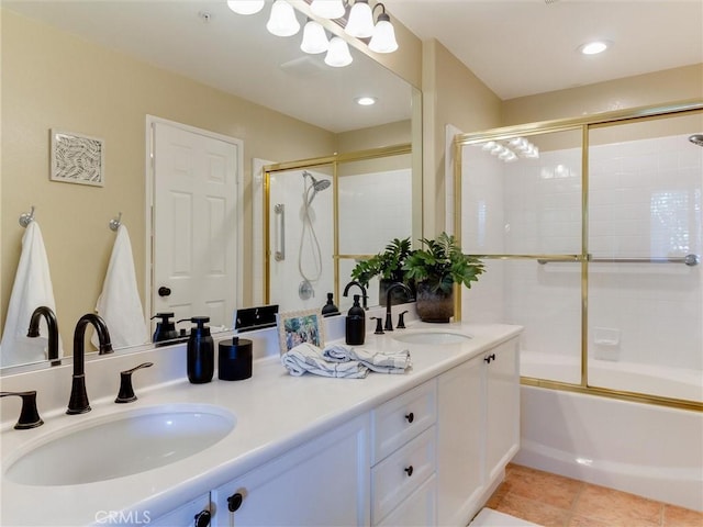 bathroom with vanity, shower / bath combination with glass door, and tile patterned flooring