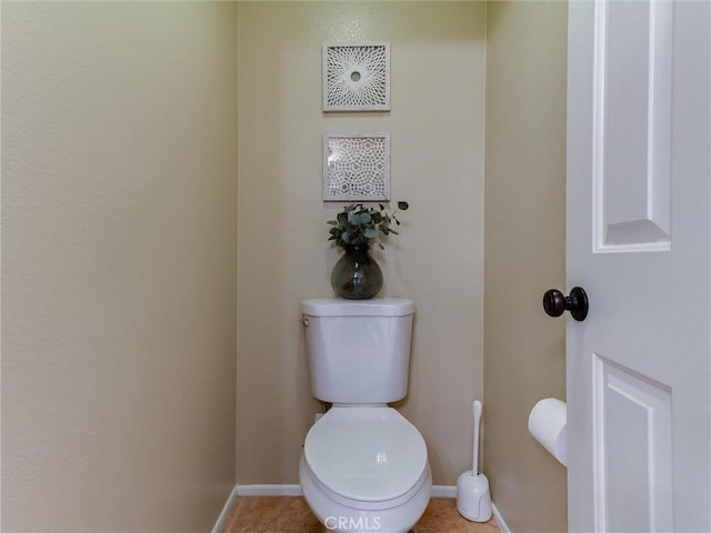 bathroom featuring toilet