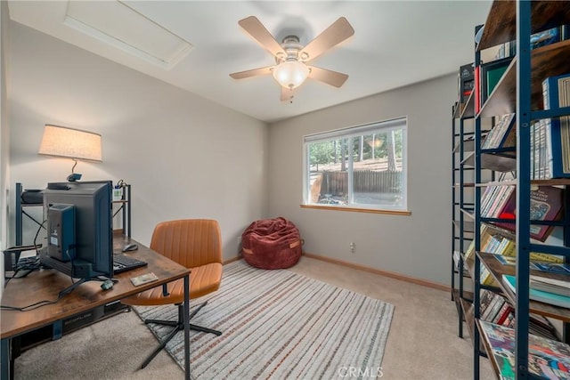 office with light colored carpet and ceiling fan