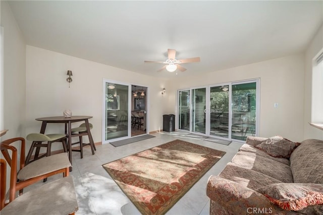 living room with ceiling fan