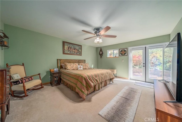 carpeted bedroom featuring ceiling fan, access to exterior, and french doors