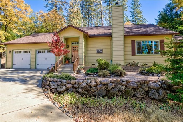 single story home featuring a garage