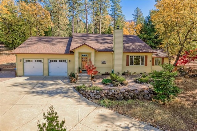 view of front of home with a garage