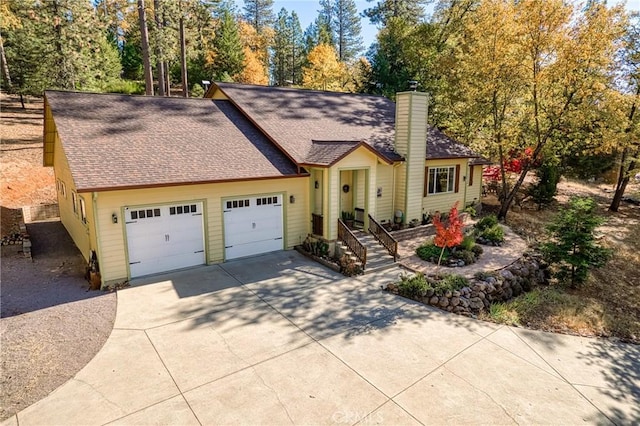 view of front of home with a garage