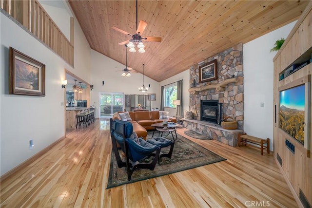 living room with ceiling fan, wooden ceiling, high vaulted ceiling, and light hardwood / wood-style flooring