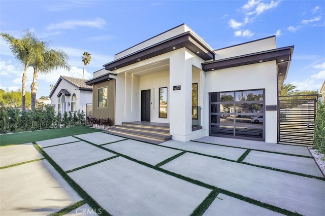 rear view of house with a patio