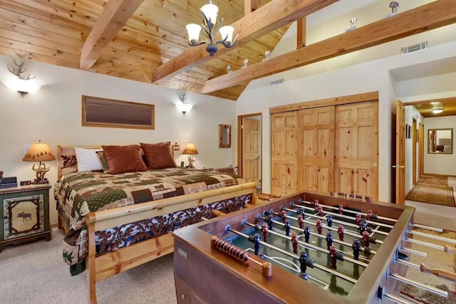 carpeted bedroom featuring vaulted ceiling with beams, wooden ceiling, and an inviting chandelier