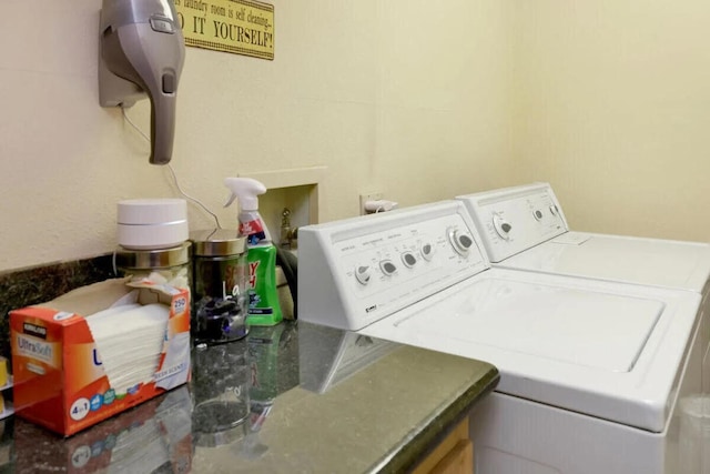 laundry area with washer and dryer