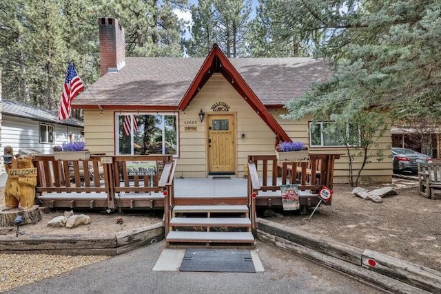 view of front of property with a deck