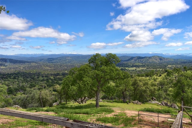 view of mountain feature with a rural view