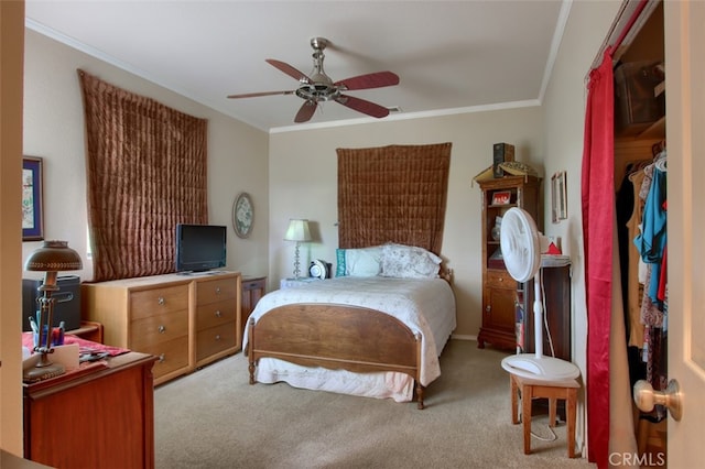 bedroom with light carpet, ceiling fan, and ornamental molding