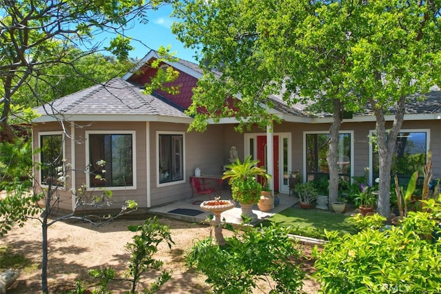 rear view of house with a patio