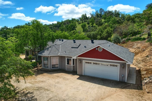 view of front of property featuring a garage