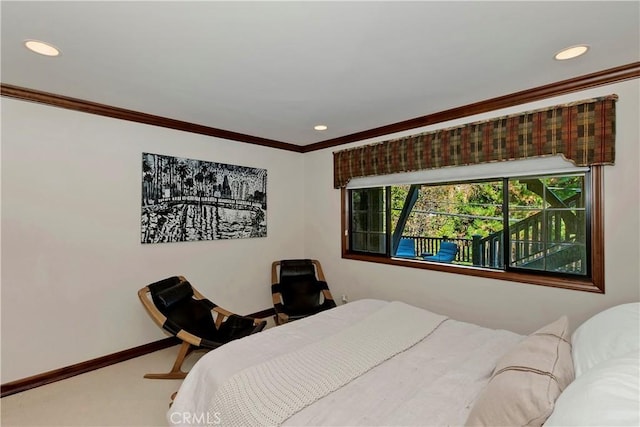 bedroom with carpet and crown molding