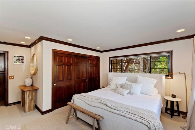 27538 W Shore Rd, Lake Arrowhead, CA 92352 - bedroom featuring a closet, light carpet, recessed lighting, and ornamental molding