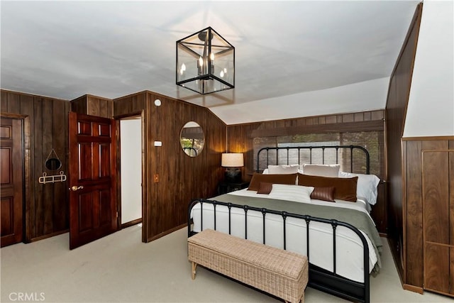 27538 W Shore Rd, Lake Arrowhead, CA 92352 - bedroom with wood walls, light carpet, and a chandelier