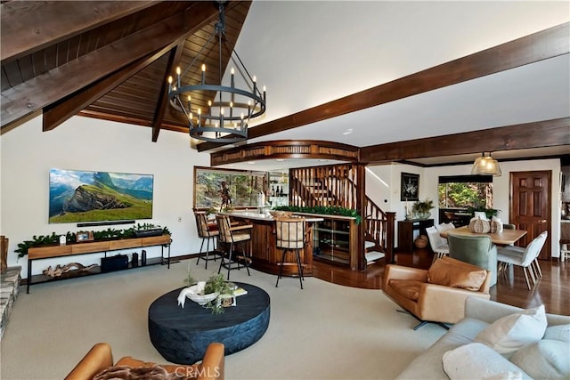 27538 W Shore Rd, Lake Arrowhead, CA 92352 - carpeted living room with stairway, beamed ceiling, a chandelier, and baseboards
