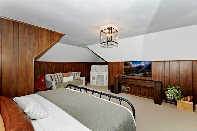 carpeted bedroom with wooden walls and a chandelier