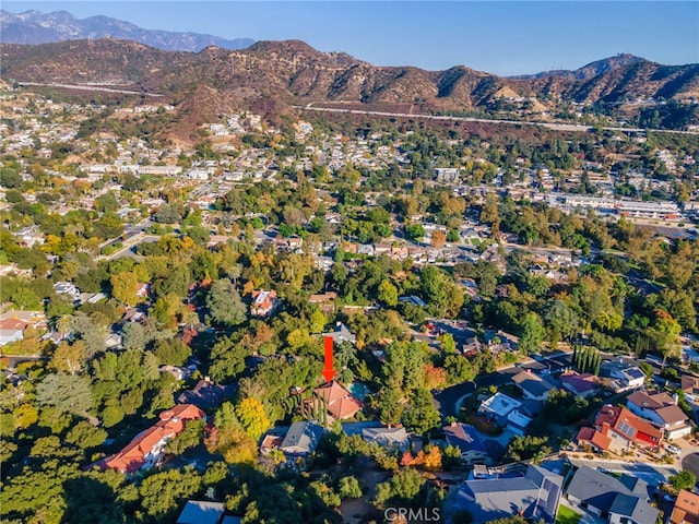 drone / aerial view featuring a mountain view