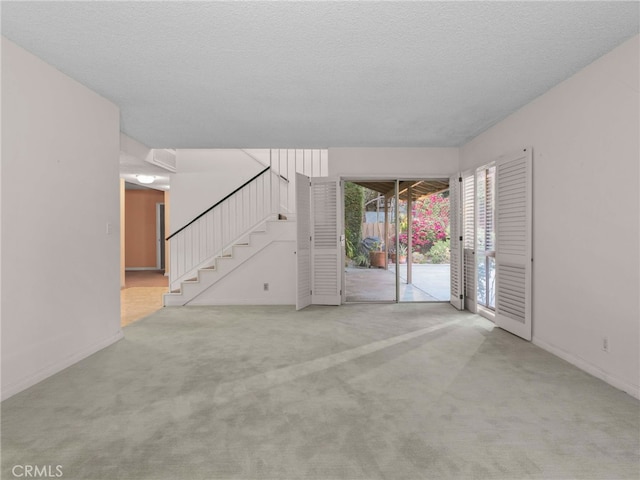 interior space with a textured ceiling