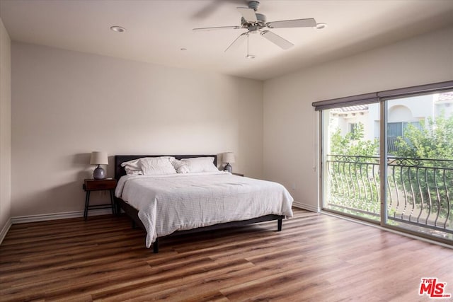 bedroom featuring access to outside, ceiling fan, and hardwood / wood-style flooring