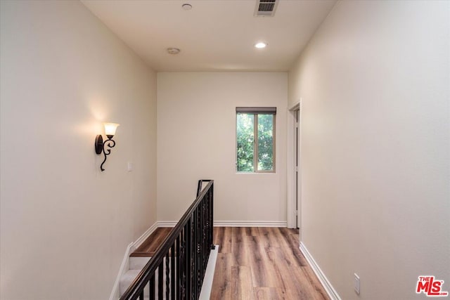 hall featuring light hardwood / wood-style floors