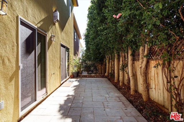 view of home's exterior with a patio